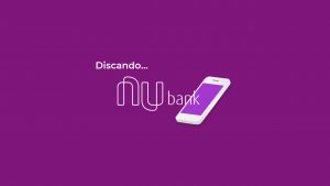 Imagem do logotipo do Nubank e, ao lado esquerdo, a palavra
